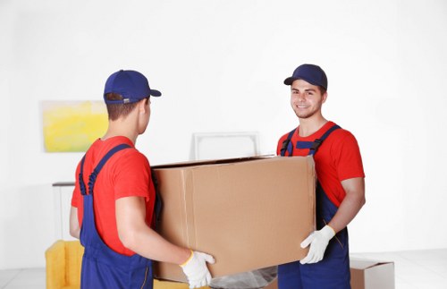 Furniture removal team collecting bulky household items in Walthamstow Village