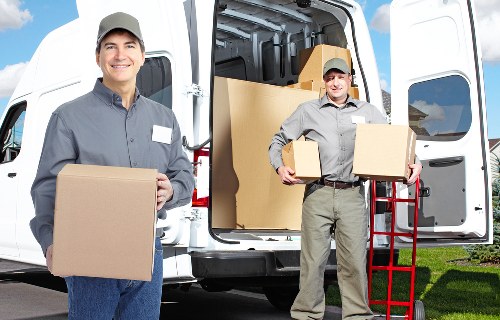 Moving boxes and furniture ready for truck hire in Walthamstow Village