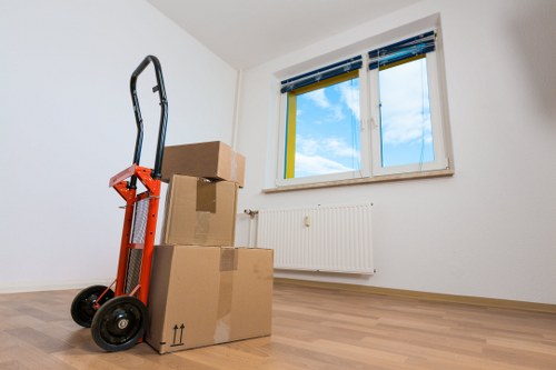 Careful furniture transport by man with van in East London