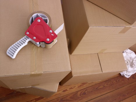 Packed office furniture and equipment ready for a commercial move in east London